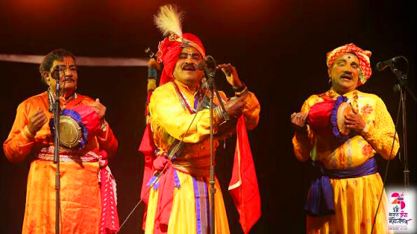 Burrakatha artists performing as a group with traditional storytelling instruments